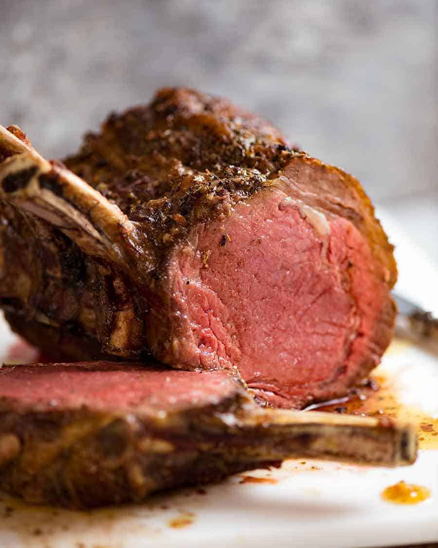 Beef Standing Rib Roast (Prime Rib) medium rare with slice cut, showing the inside