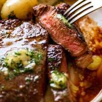 Close up of slice of juicy marinated steak