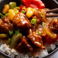 Sweet and Sour Pork in a bowl, ready to be eaten