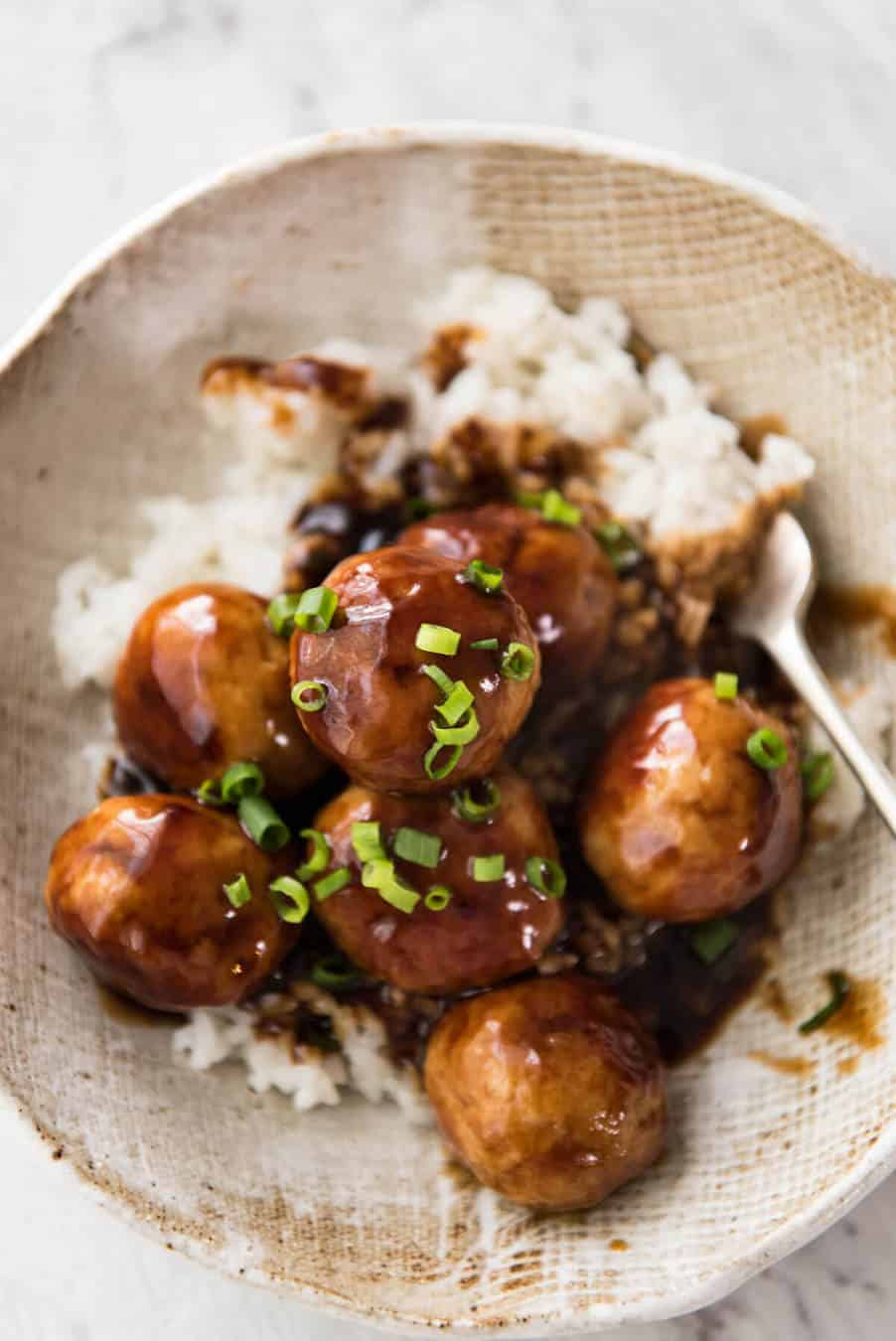 If you love juicy, plump chicken meatballs and Teriyaki sauce, you will go mad over these Teriyaki Chicken Meatballs! recipetineats.com