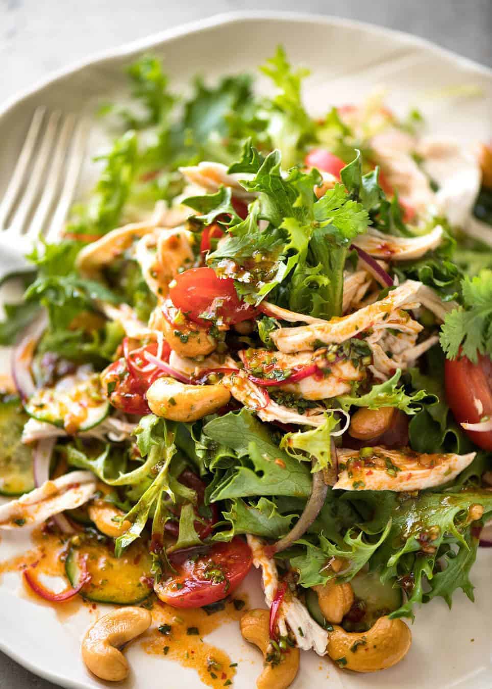 Thai Chicken Salad with a bright zesty Chilli Lime Dressing, classic balance of Thai tangy-sweet-salty flavours. recipetineats.com