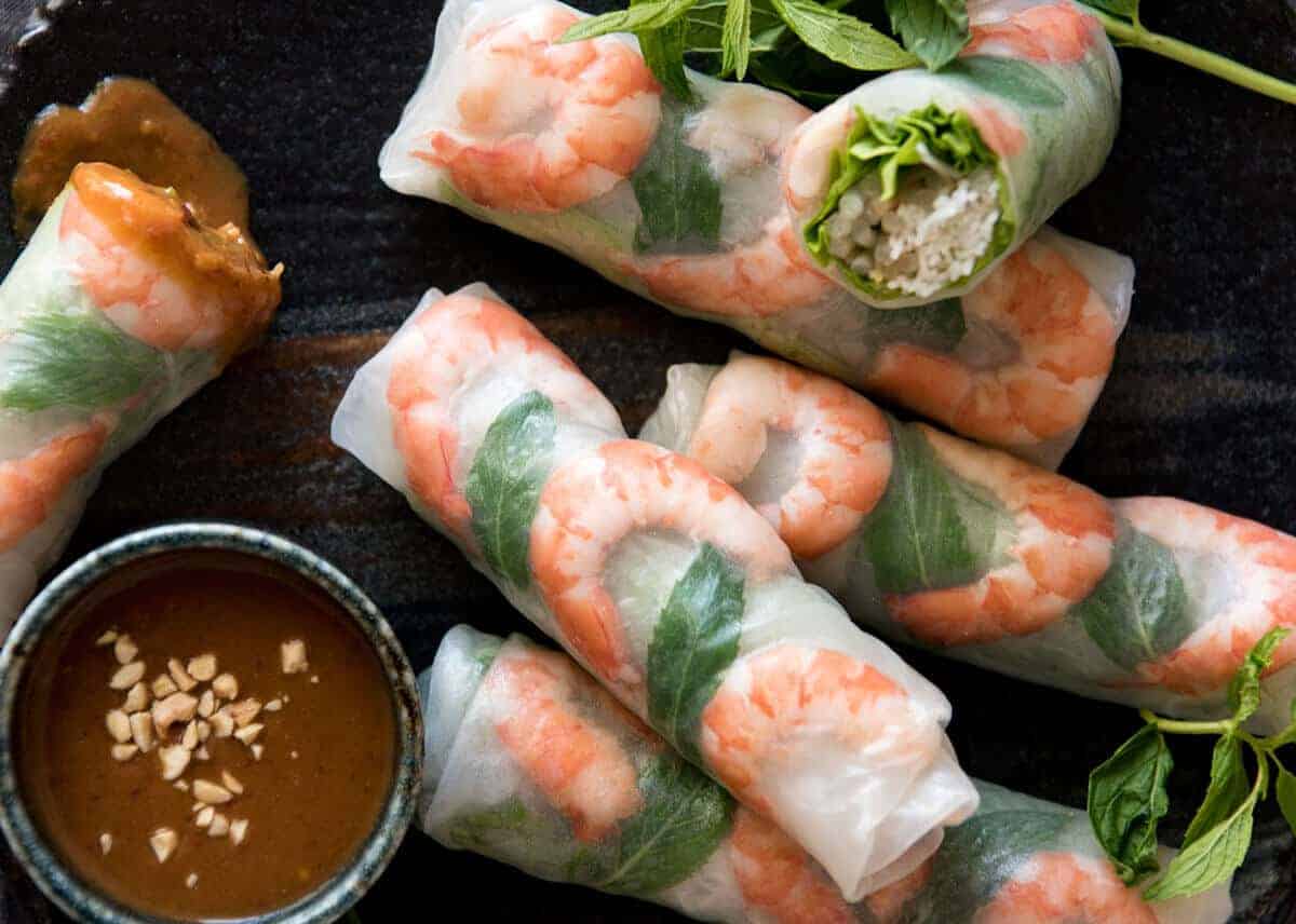 Jam packed with fresh, bright flavours, learn how to make Vietnamese Rice Paper Rolls with an easy to follow video tutorial and step by step photos. Served with an addictive Vietnamese Peanut Dipping Sauce! recipetineats.com